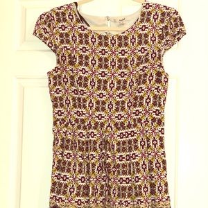 Simple mandala designed dress with circular eyelet